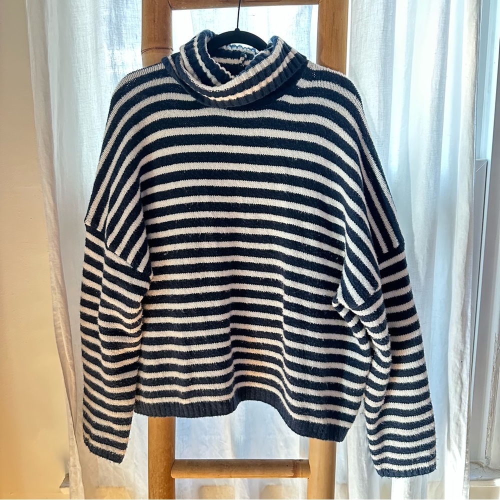 Blue and white striped sweater